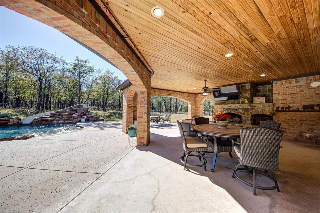 9199 Fm 1810 Chico, TX 76431 - Photo 33 of 40 a outdoor space with a large window and chairs