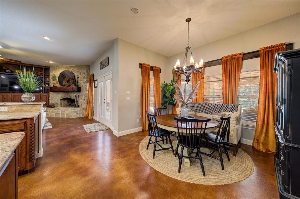 9199 Fm 1810 Chico, TX 76431 - Photo 9 of 40 a view of a dining room with furniture window and wooden floor