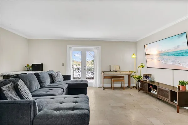 a living room with furniture and a couch