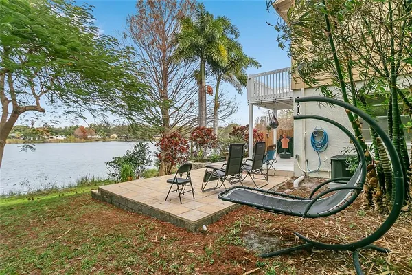a view of a swimming pool with a patio