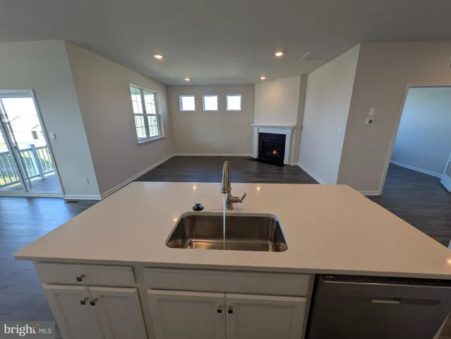 a view of balcony with wooden floor
