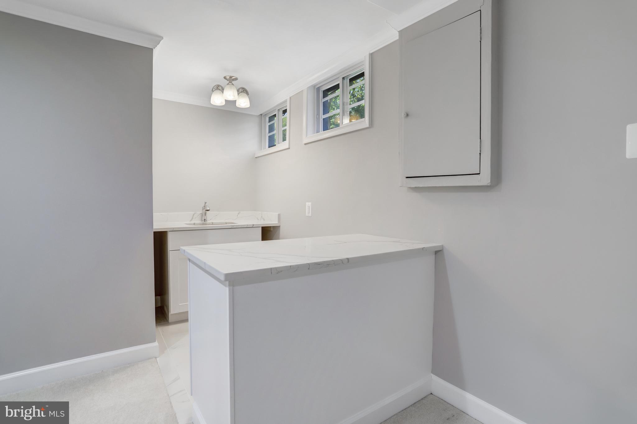 5775 Heming Avenue Springfield, VA 22151 - Photo 45 of 88 Lower level bar and sink