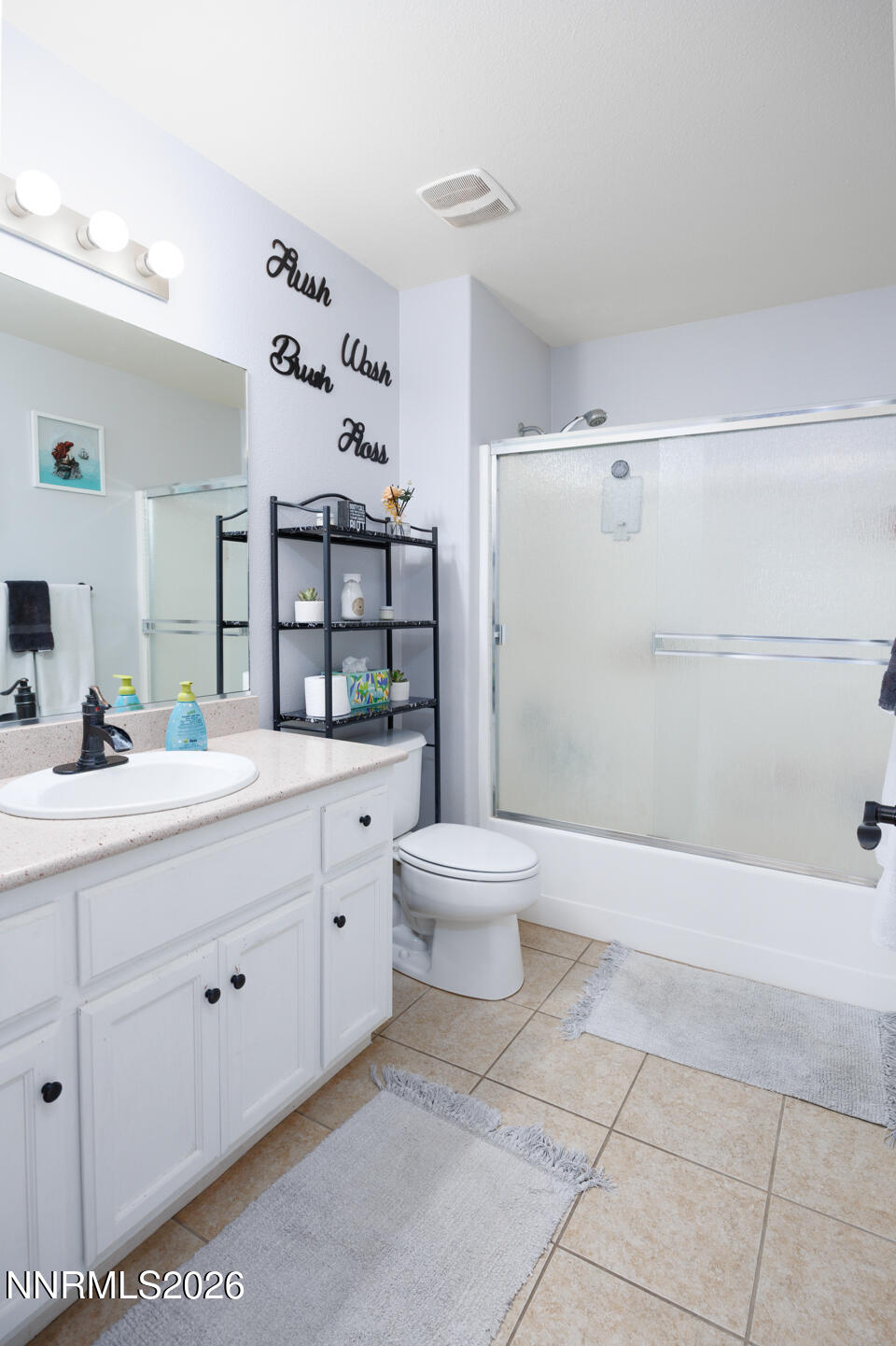 440 Cornerstone Court Fallon, NV 89406 - Photo 15 of 31 a bathroom with a sink a toilet and shower