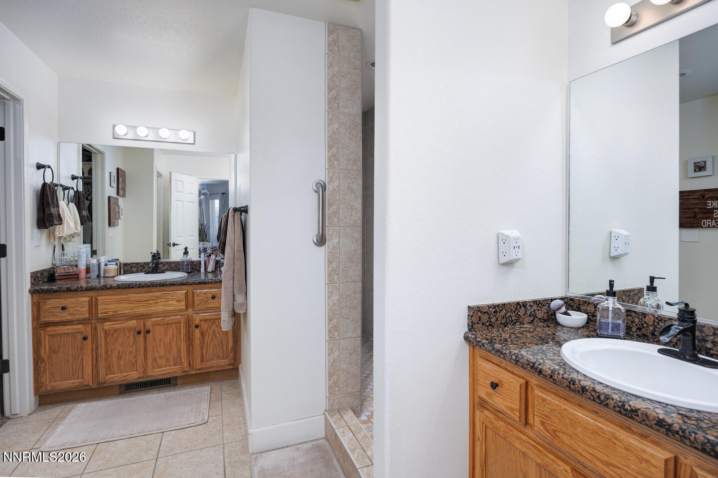 440 Cornerstone Court Fallon, NV 89406 - Photo 19 of 31 a bathroom with a granite countertop sink double and mirror