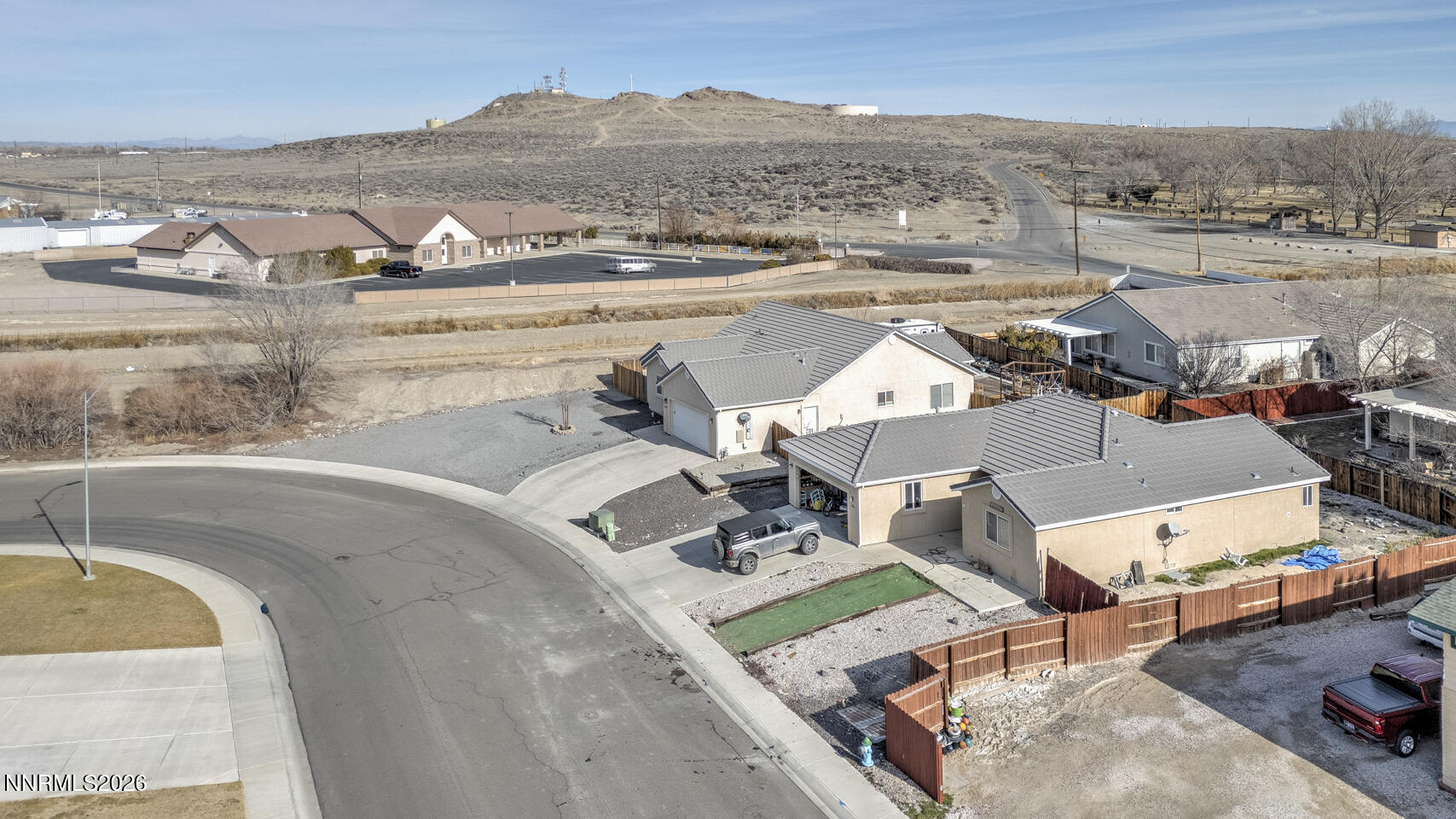 440 Cornerstone Court Fallon, NV 89406 - Photo 3 of 31 an aerial view of a house with outdoor space and lake view