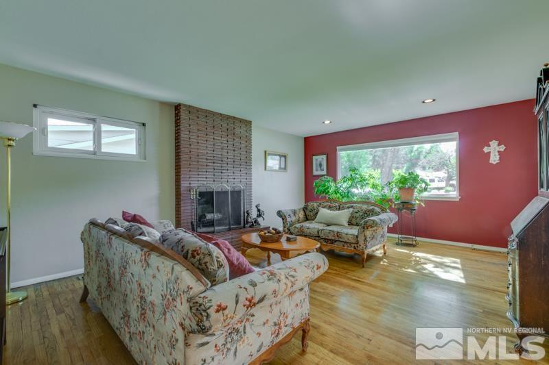 1870 Watt Street Reno, NV 89509 - Photo 5 of 26 a living room with furniture and a fireplace