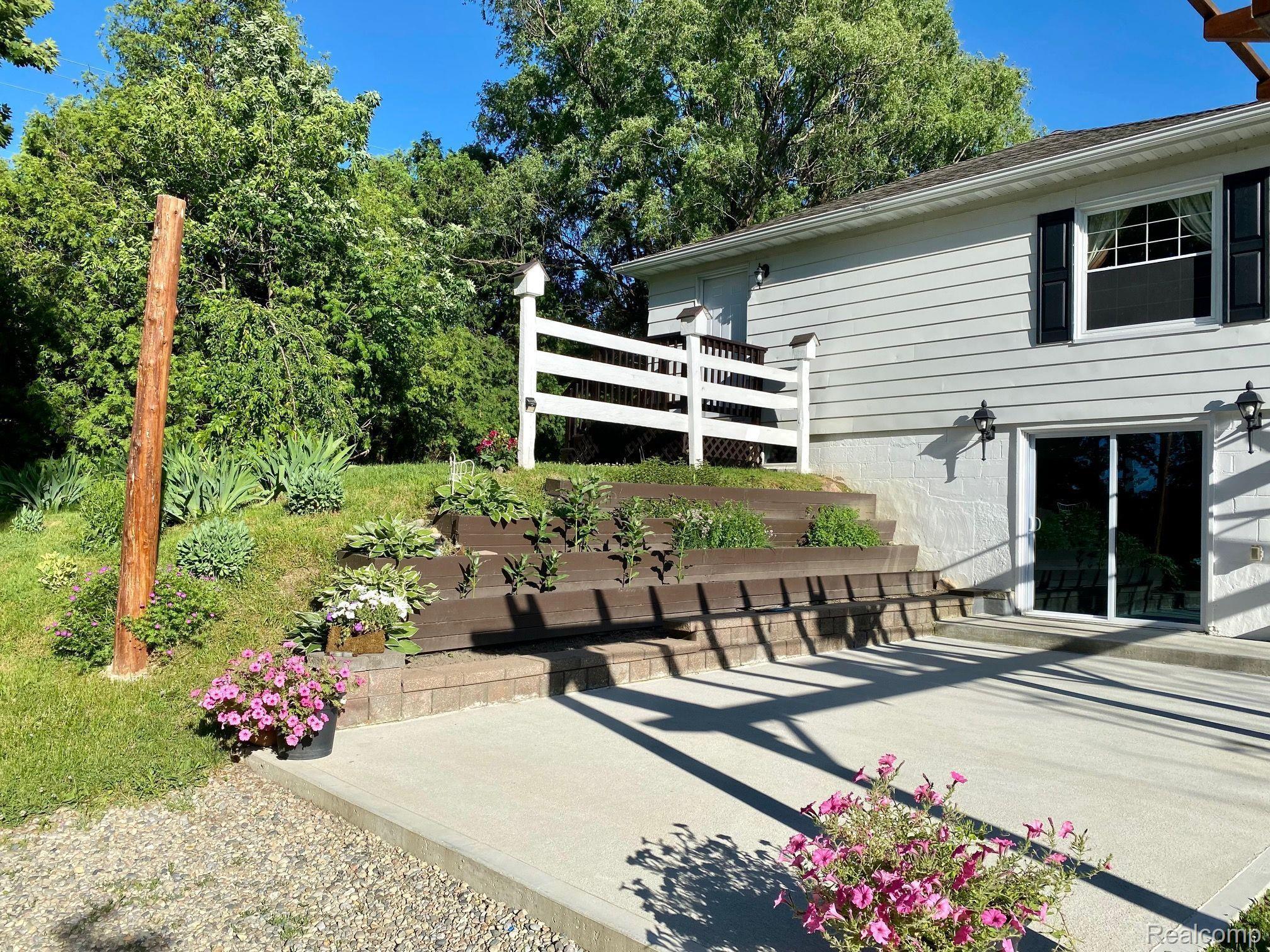 5102 South Lapeer Road Metamora, MI 48455 - Photo 2 of 42 Sunny walkout Patio.