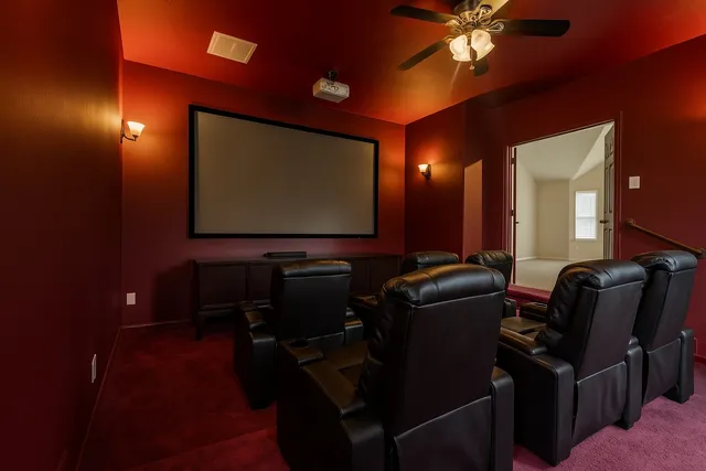 a room with furniture and screen