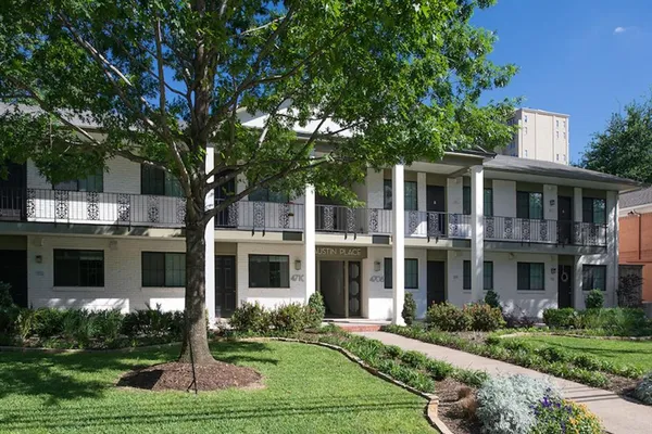 a front view of a building with yard