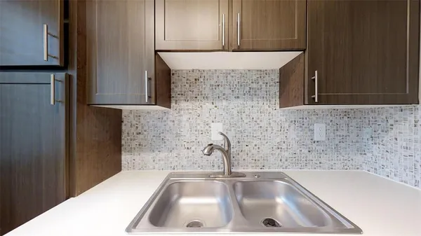 a close view of a sink and tap