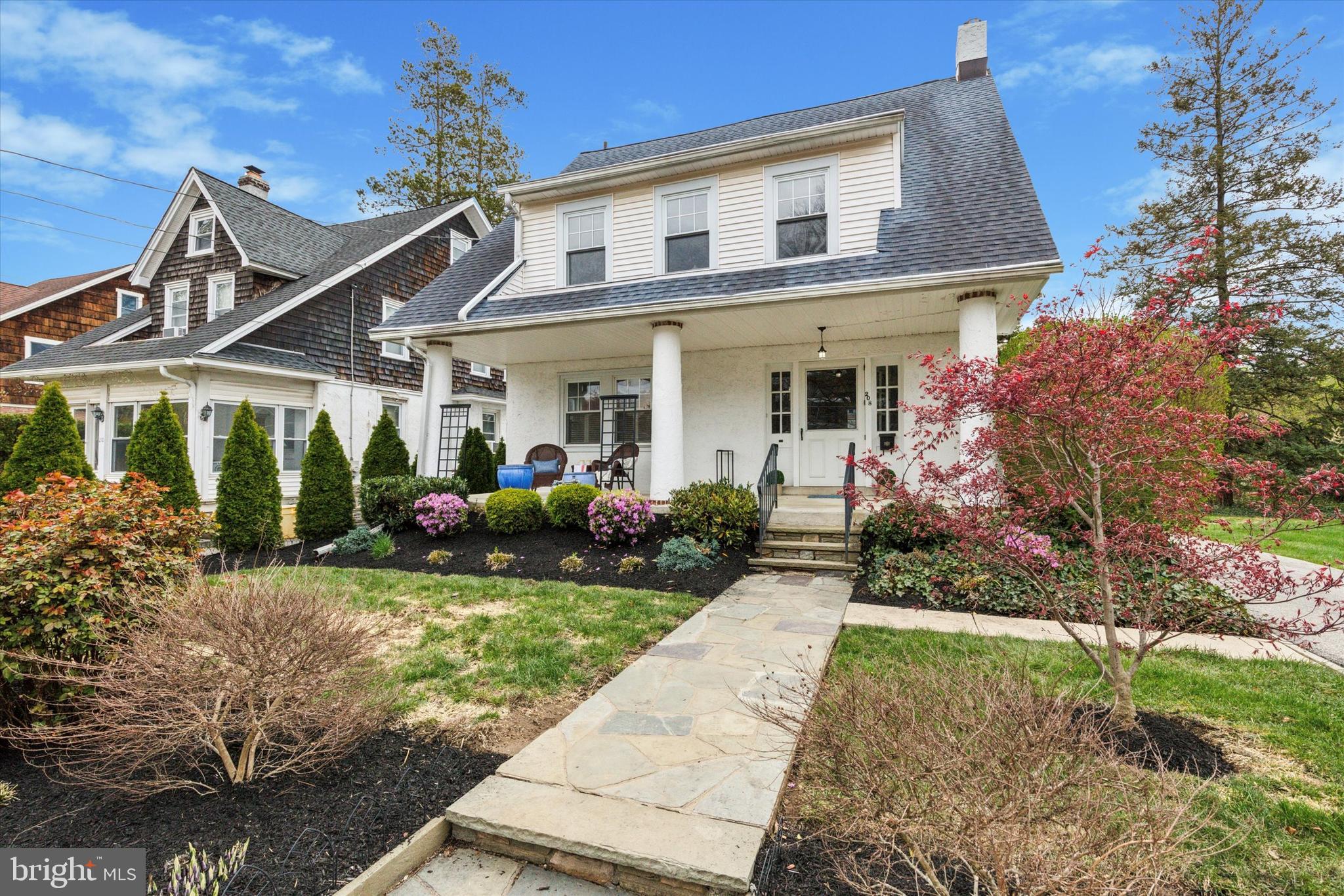 208 Sabine Avenue Narberth, PA 19072 - Photo 1 of 38 front view of a house with a yard