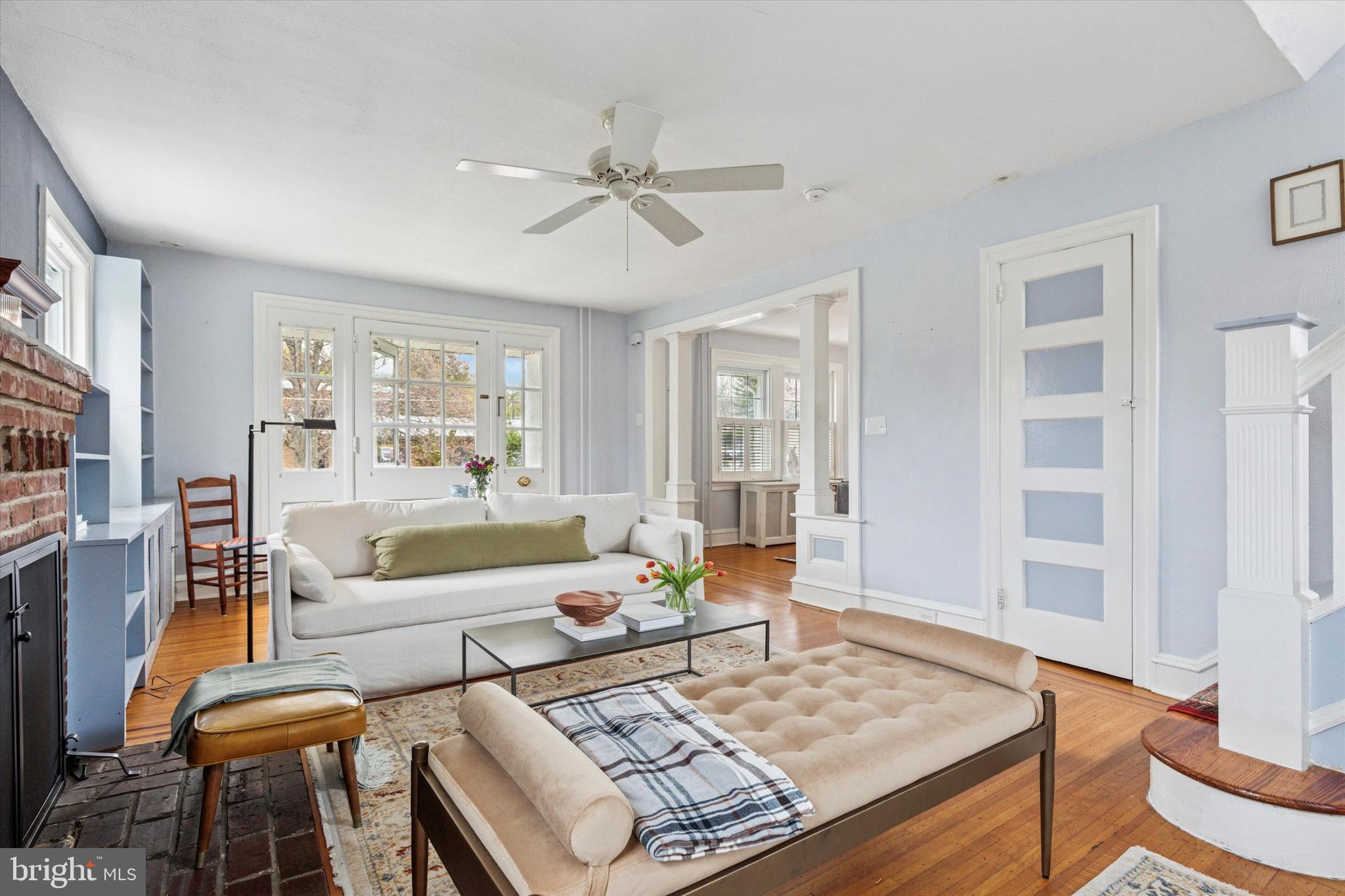 208 Sabine Avenue Narberth, PA 19072 - Photo 11 of 38 a living room with furniture and a rug