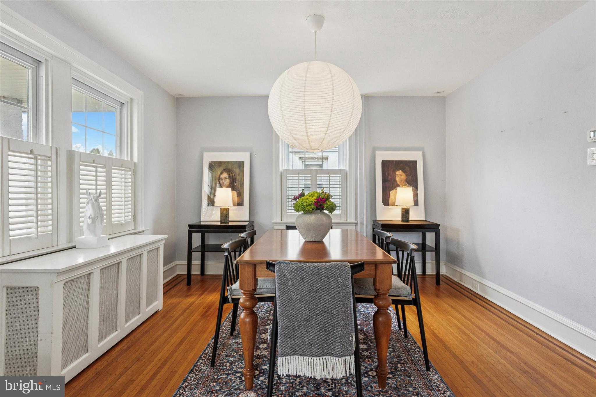 208 Sabine Avenue Narberth, PA 19072 - Photo 12 of 38 a view of a dining room with furniture and wooden floor