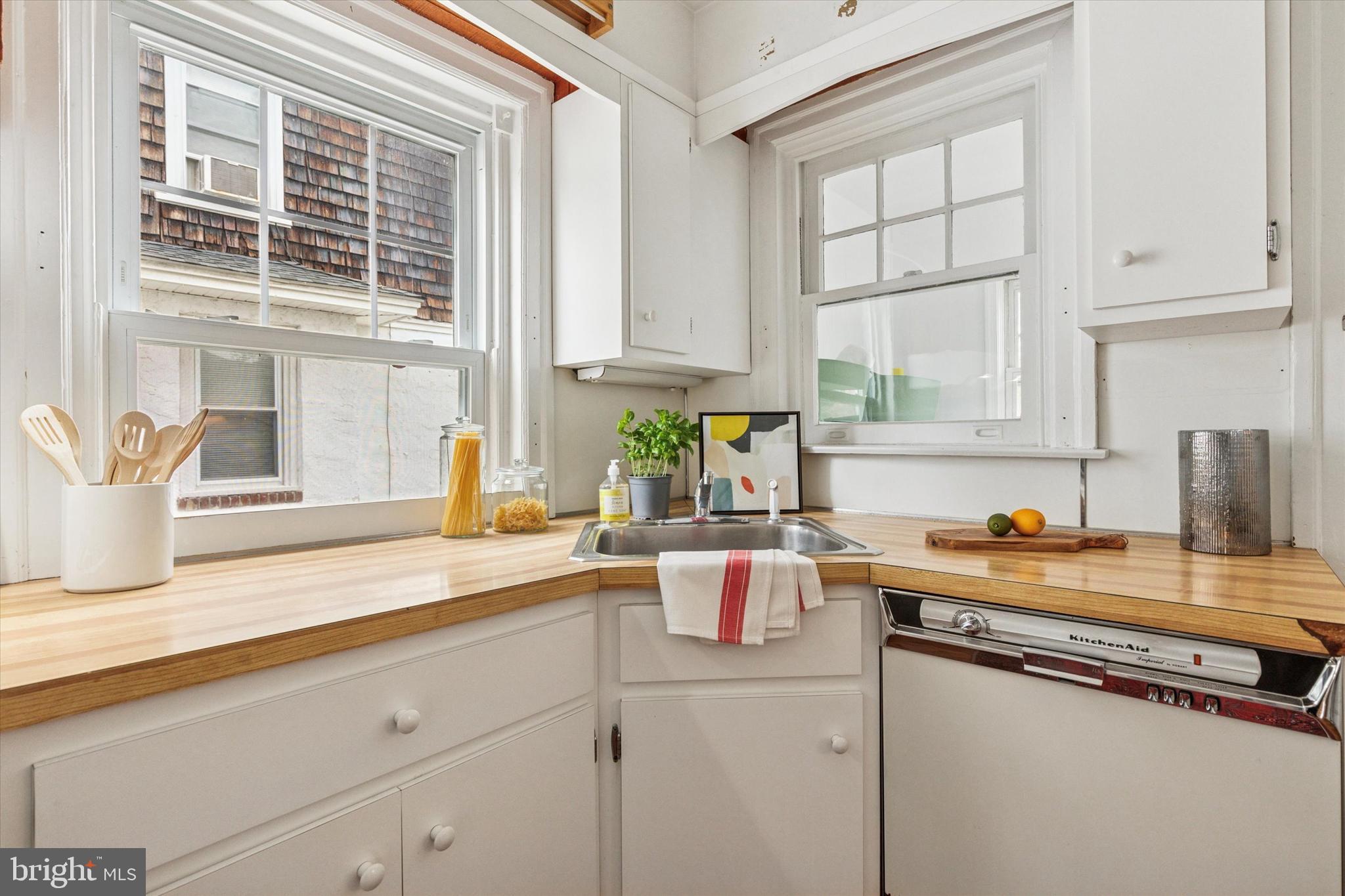 208 Sabine Avenue Narberth, PA 19072 - Photo 18 of 38 a kitchen with a sink and a window
