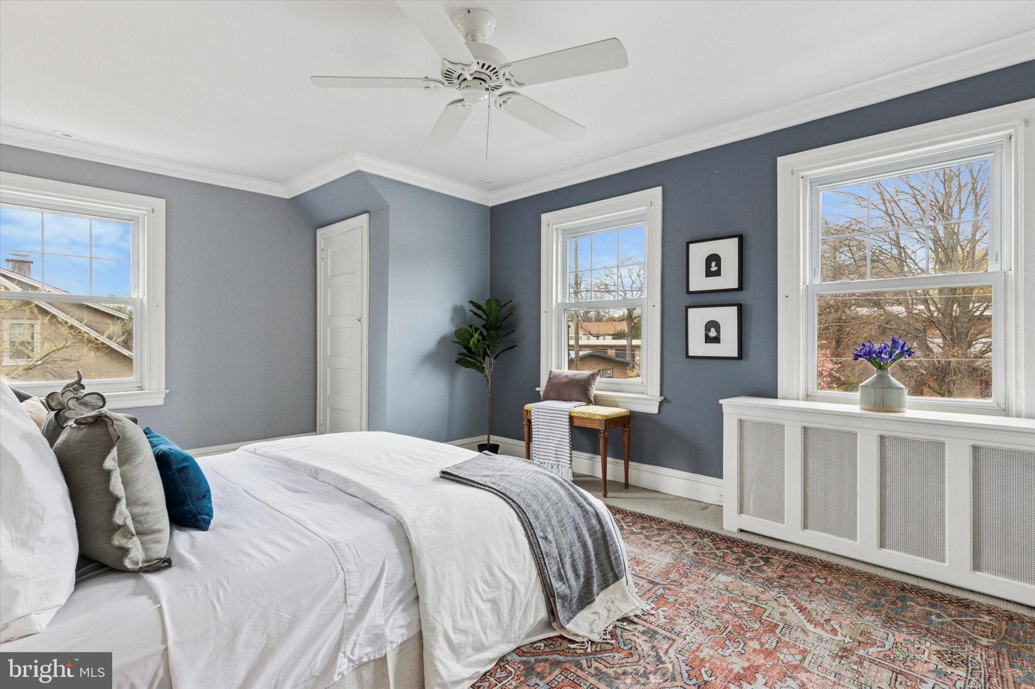 208 Sabine Avenue Narberth, PA 19072 - Photo 25 of 38 a bedroom with a large bed and a window