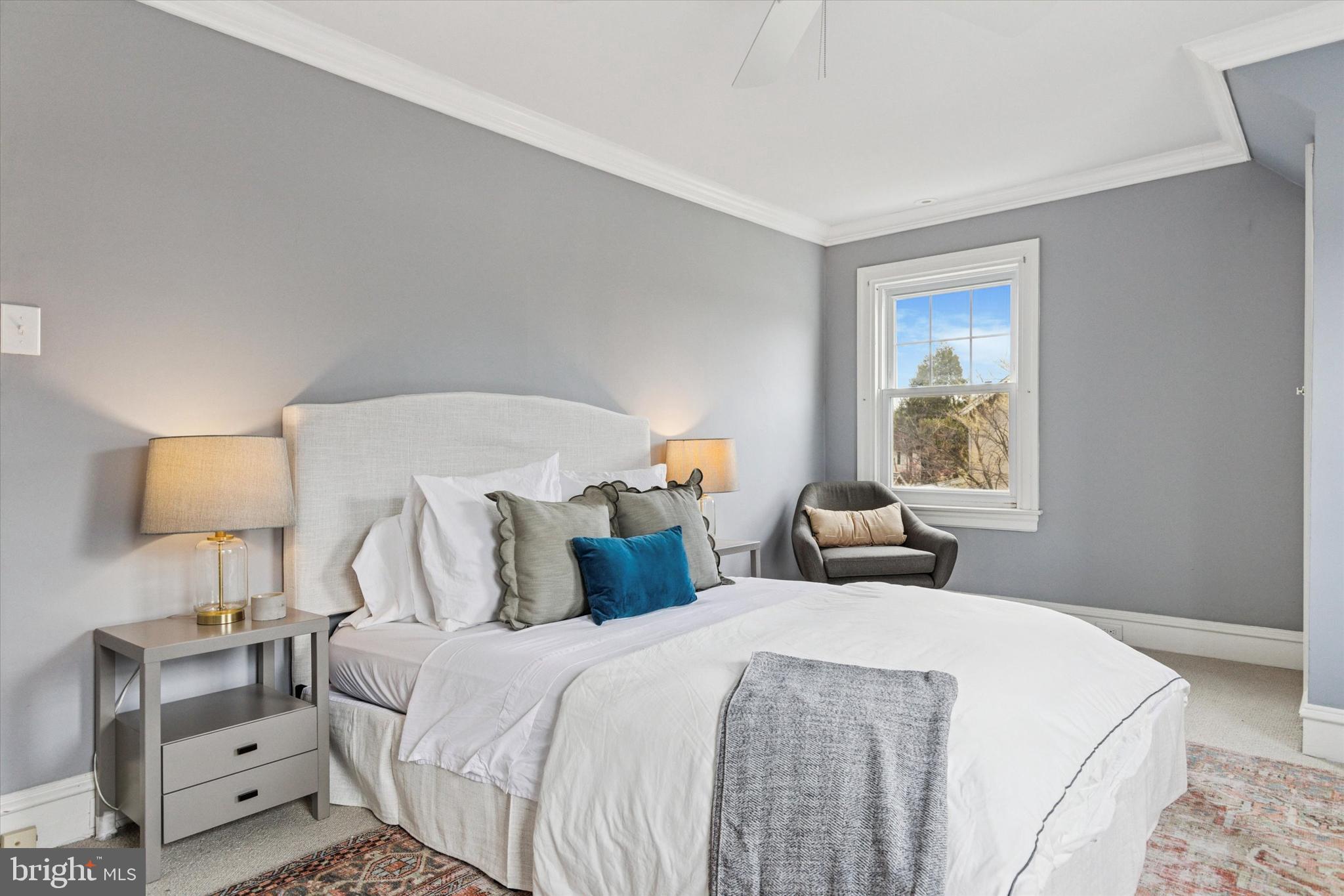 208 Sabine Avenue Narberth, PA 19072 - Photo 26 of 38 a bedroom with two beds and a window