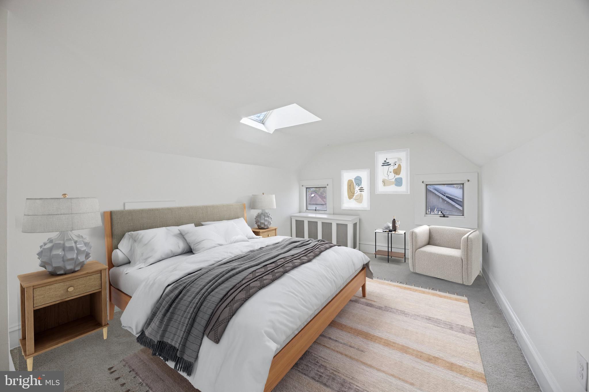 208 Sabine Avenue Narberth, PA 19072 - Photo 37 of 38 a bedroom with a bed and a couch