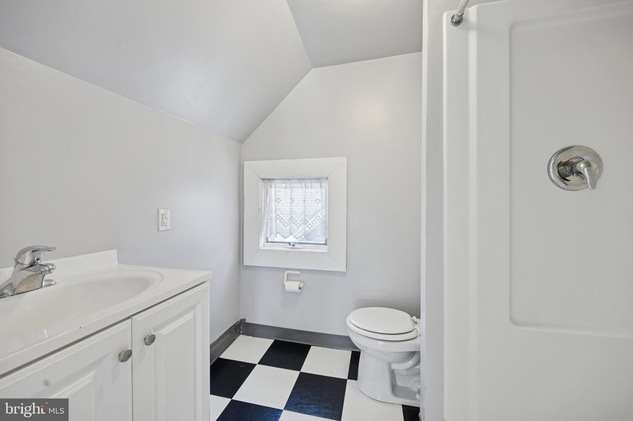 208 Sabine Avenue Narberth, PA 19072 - Photo 38 of 38 a bathroom with a sink a toilet and a mirror
