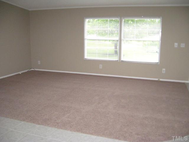 450 Al Gray Road Timberlake, NC 27583 - Photo 5 of 14 Beautiful living room with large windows
