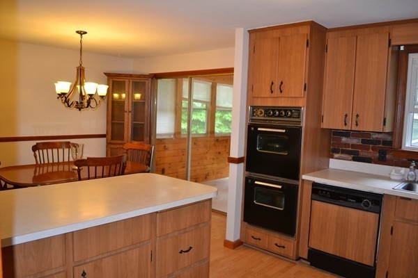 78 Bay Road Easton, MA 02356 - Photo 6 of 30 a kitchen with stainless steel appliances a stove refrigerator and cabinets