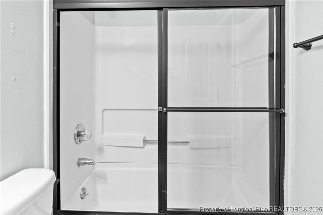 6654 Vaughn Road Fayetteville, NC 28304 - Photo 20 of 36 a bathroom with a shower
