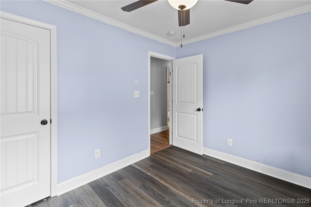 6654 Vaughn Road Fayetteville, NC 28304 - Photo 25 of 36 wooden floor in an empty room