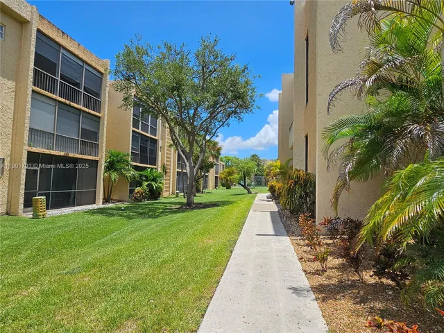 a view of building with yard