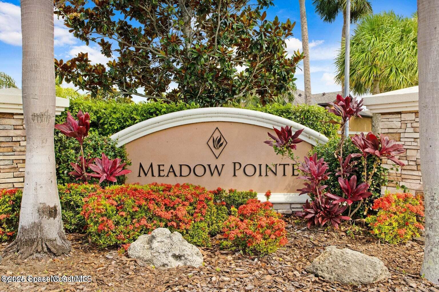 1430 Lara Circle, Unit 103 Rockledge, FL 32955 - Photo 2 of 39 a sign on the side of a road