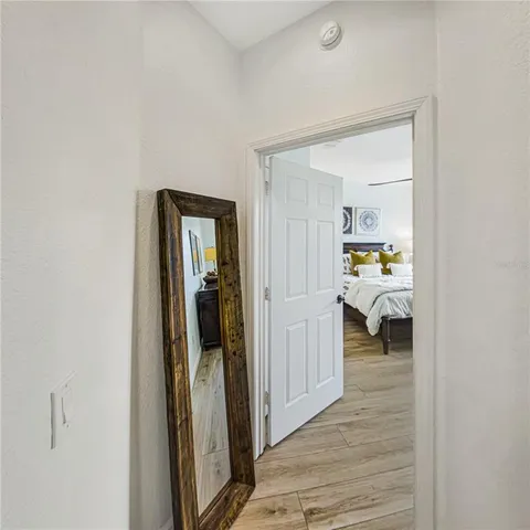 a en suite bathroom with a toilet sink and mirror