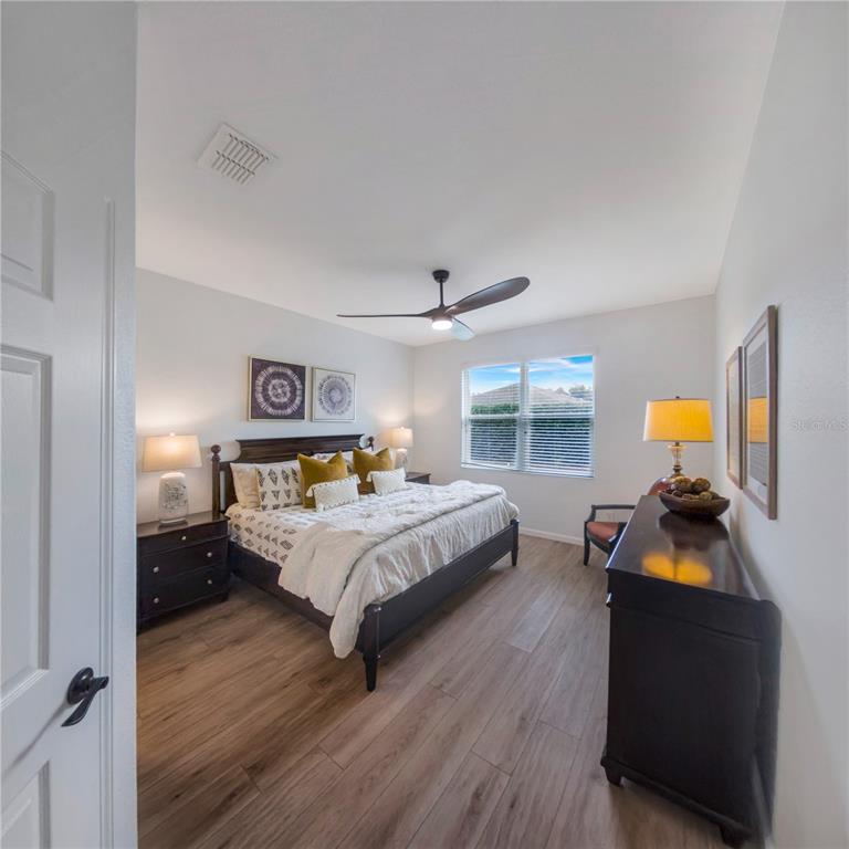 7235 Southwest 91st Court Ocala, FL 34481 - Photo 15 of 23 a bedroom with bed and window