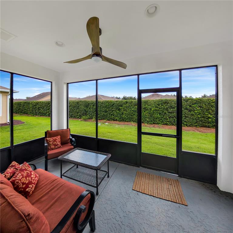 7235 Southwest 91st Court Ocala, FL 34481 - Photo 21 of 23 a living room with couch and windows