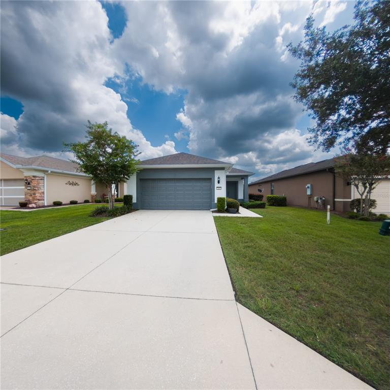 7235 Southwest 91st Court Ocala, FL 34481 - Photo 23 of 23 a front view of house with yard