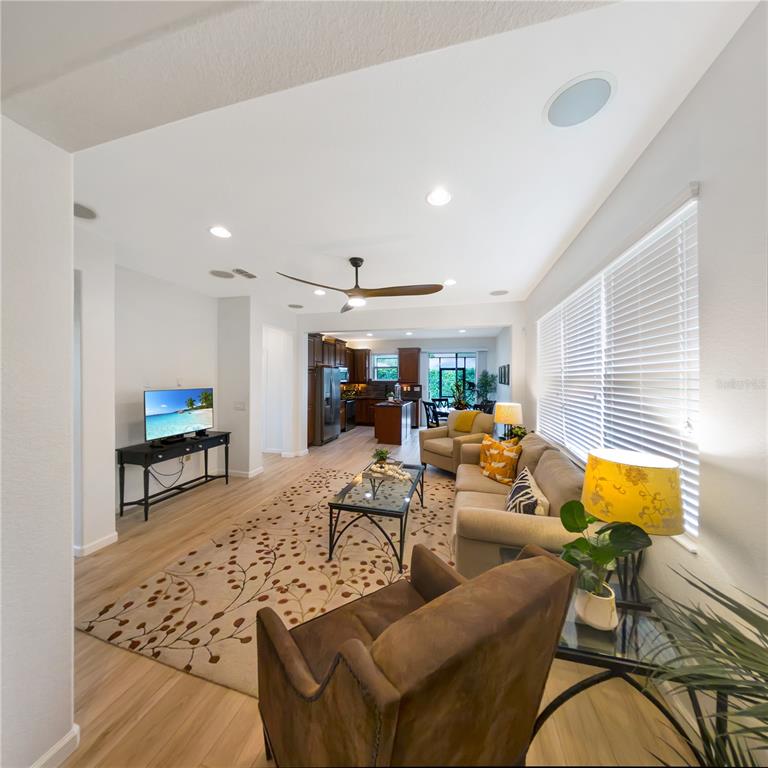 7235 Southwest 91st Court Ocala, FL 34481 - Photo 7 of 23 a living room with furniture and a rug