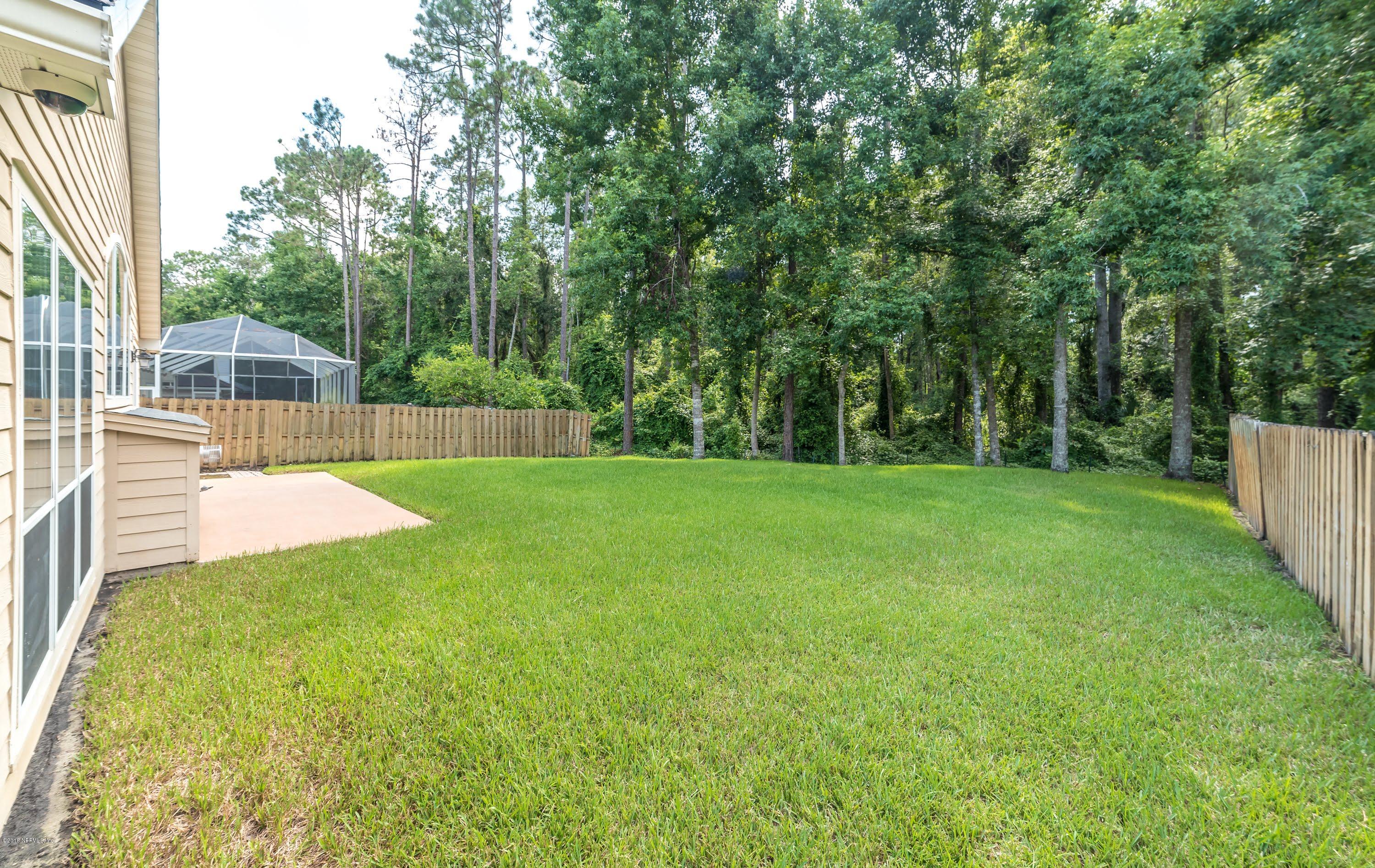 8964 Timberjack Lane Jacksonville, FL 32256 - Photo 21 of 23 a view of a backyard