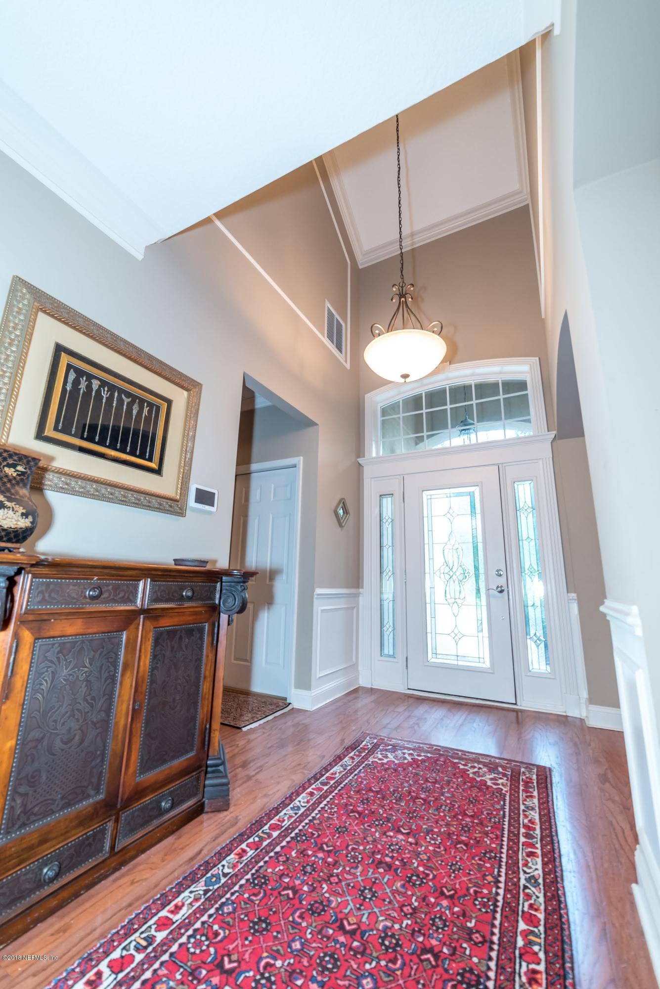 8964 Timberjack Lane Jacksonville, FL 32256 - Photo 4 of 23 a view of a livingroom with furniture and window