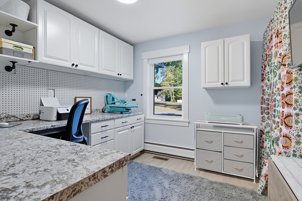 178 County Road Southampton, MA 01073 - Photo 23 of 41 a kitchen with white cabinets and appliances