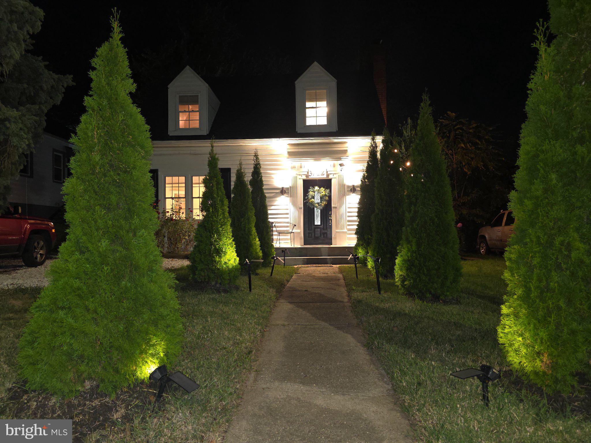 3712 West Cold Spring Lane Baltimore, MD 21215 - Photo 3 of 39 Charming home aglow under night sky.