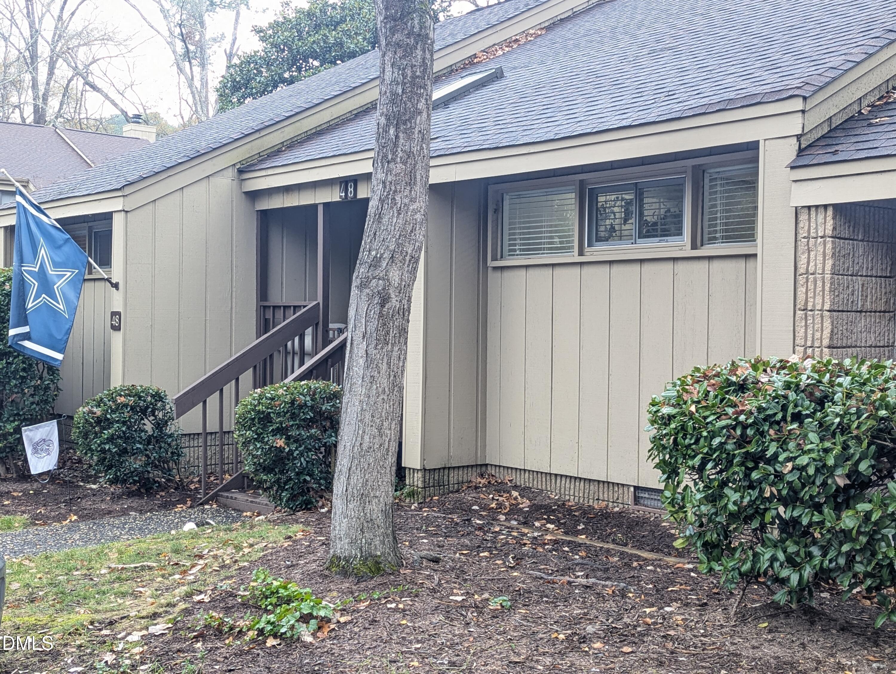 a house with a window and yard
