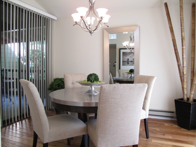 2040 West Middlefield Road, Unit 2 Mountain View, CA 94043 - Photo 3 of 4 a view of a dining room with furniture and wooden floor