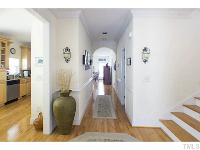 1172 Harp Street Raleigh, NC 27604 - Photo 4 of 25 View of hallway from front entrance. Stairs to second floor on the right. Staircase