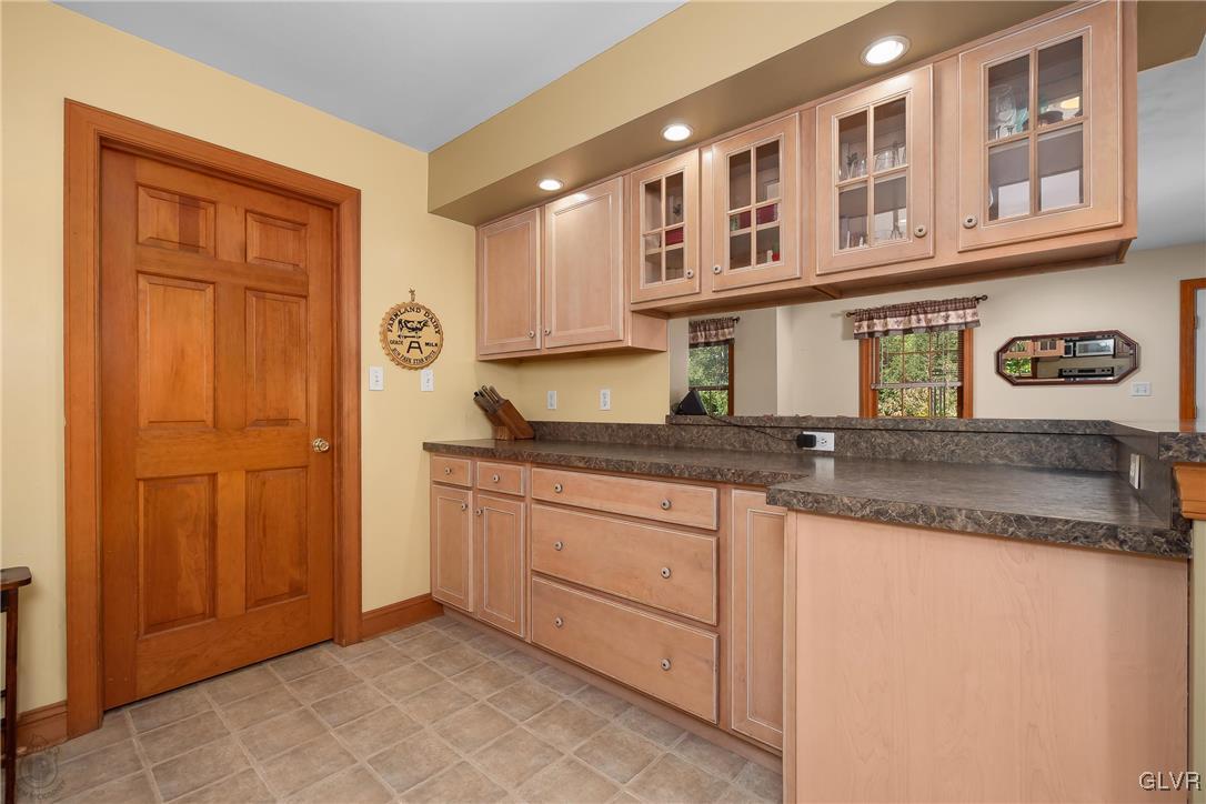 2413 Point Phillips Road Kunkletown, PA 18058 - Photo 19 of 48 a kitchen with stainless steel appliances granite countertop a sink dishwasher stove and cabinets