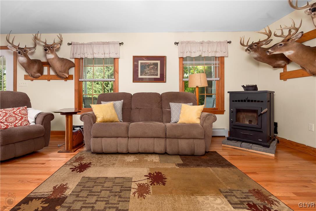 2413 Point Phillips Road Kunkletown, PA 18058 - Photo 24 of 48 a living room with furniture and a fireplace