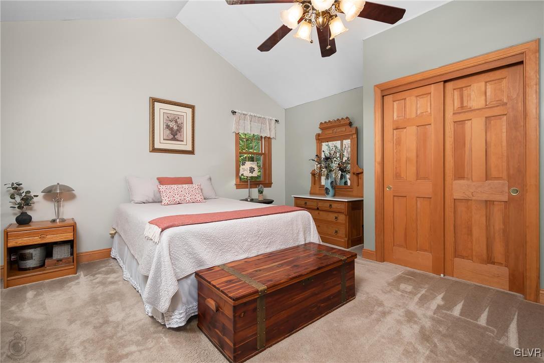2413 Point Phillips Road Kunkletown, PA 18058 - Photo 25 of 48 a bedroom with a bed and a chandelier