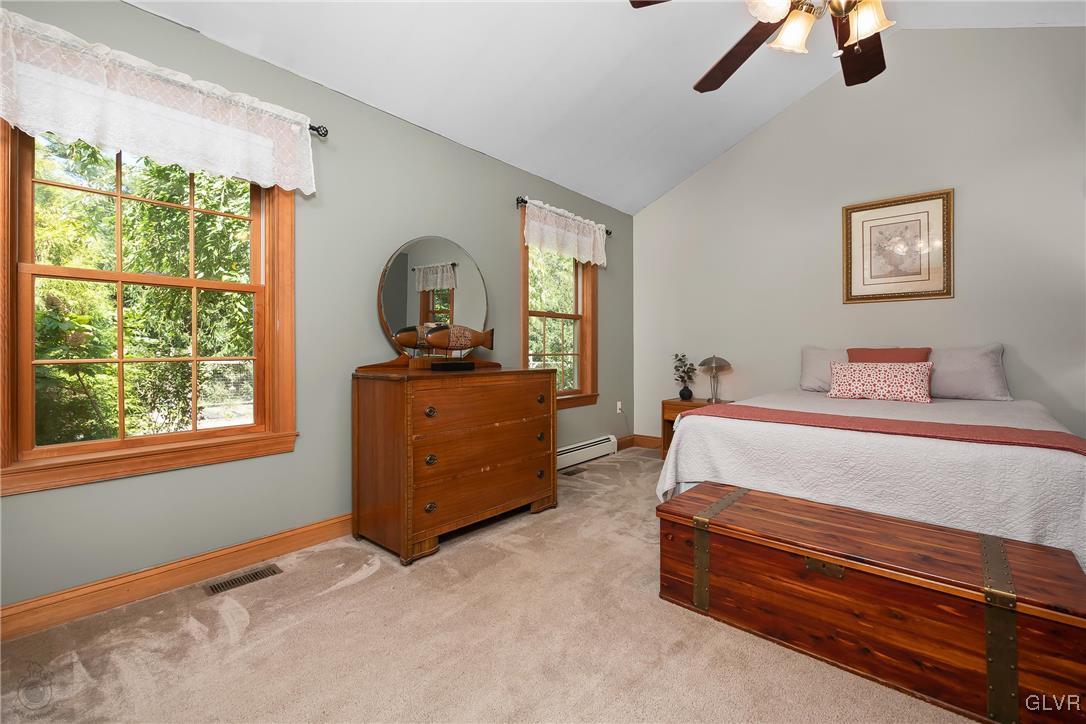 2413 Point Phillips Road Kunkletown, PA 18058 - Photo 26 of 48 a bedroom with a bed and a flat tv screen on the dresser