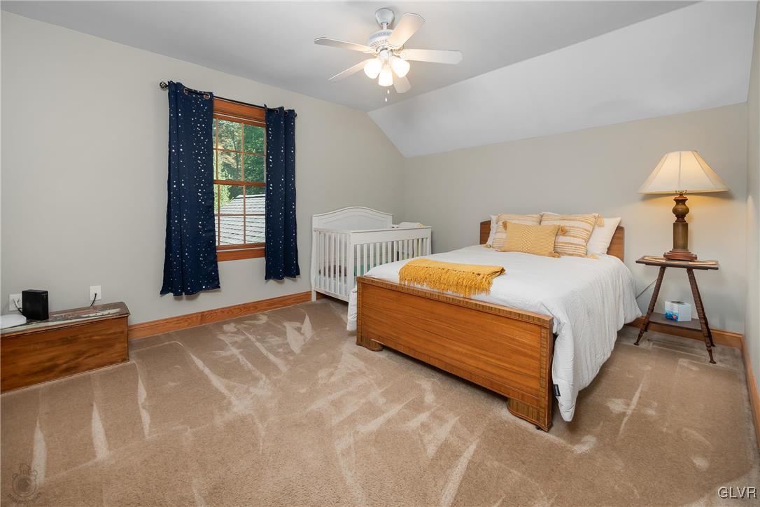 2413 Point Phillips Road Kunkletown, PA 18058 - Photo 29 of 48 a bedroom with a bed and a lamp on table