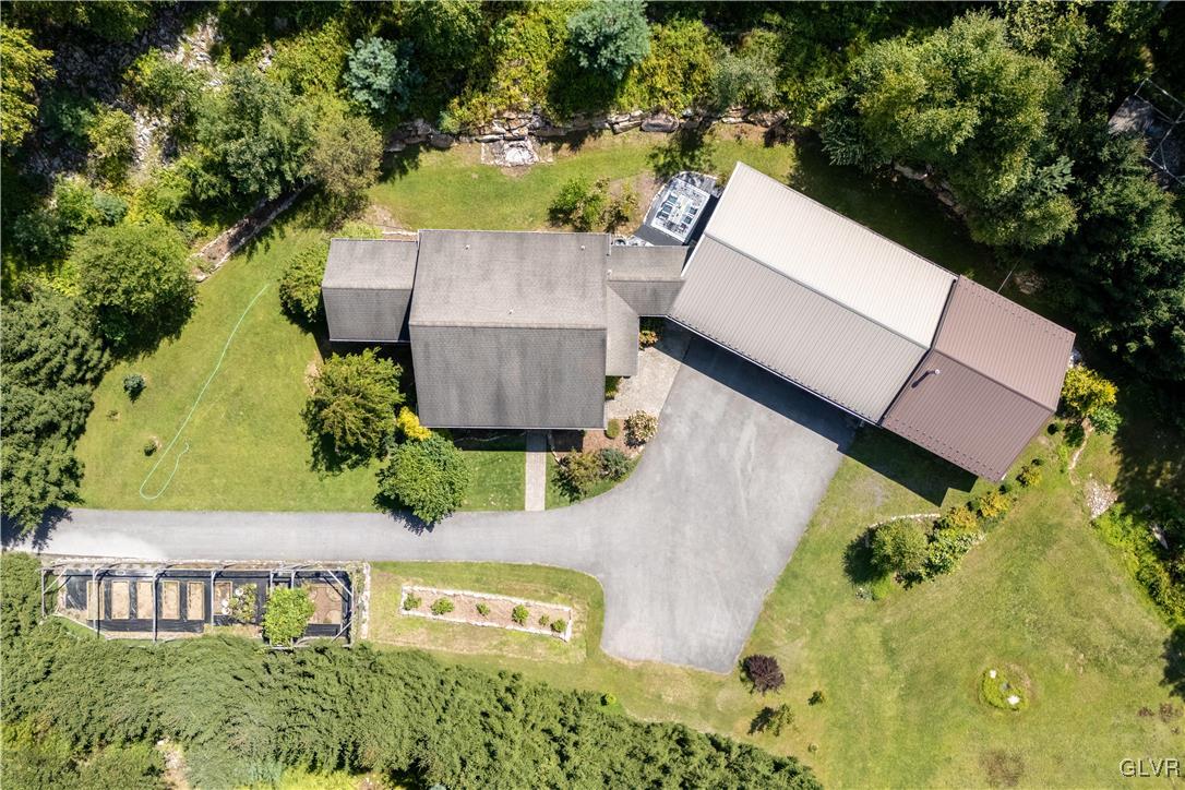 2413 Point Phillips Road Kunkletown, PA 18058 - Photo 5 of 48 an aerial view of a house with a yard basket ball court and outdoor seating