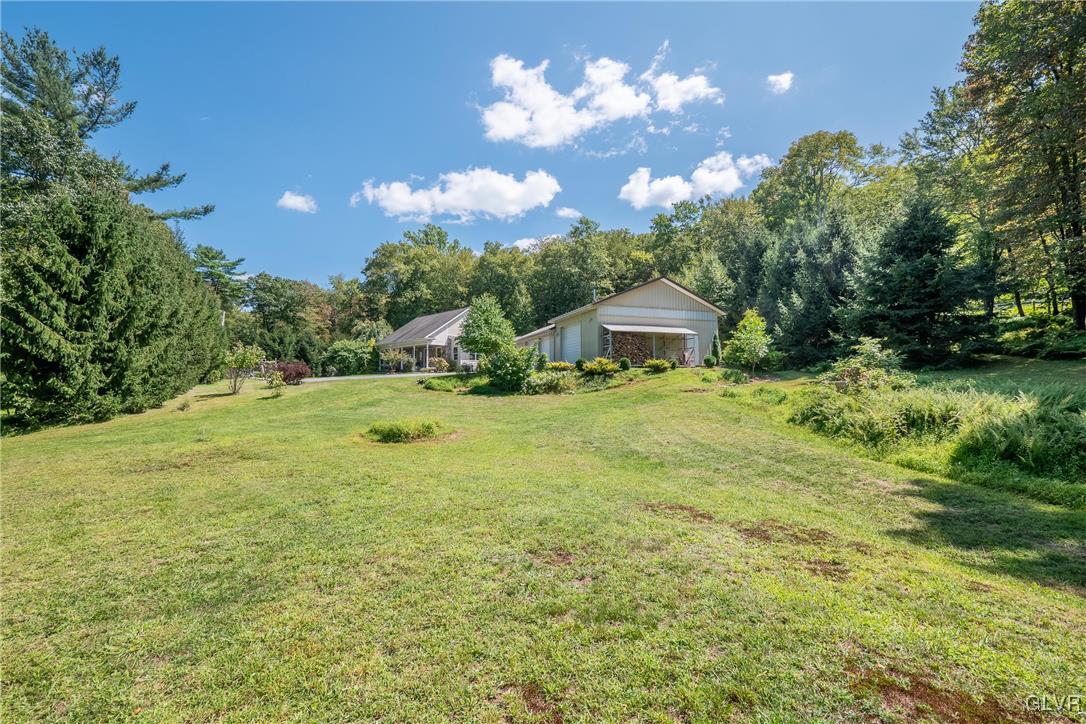 2413 Point Phillips Road Kunkletown, PA 18058 - Photo 6 of 48 a view of a house with a big yard