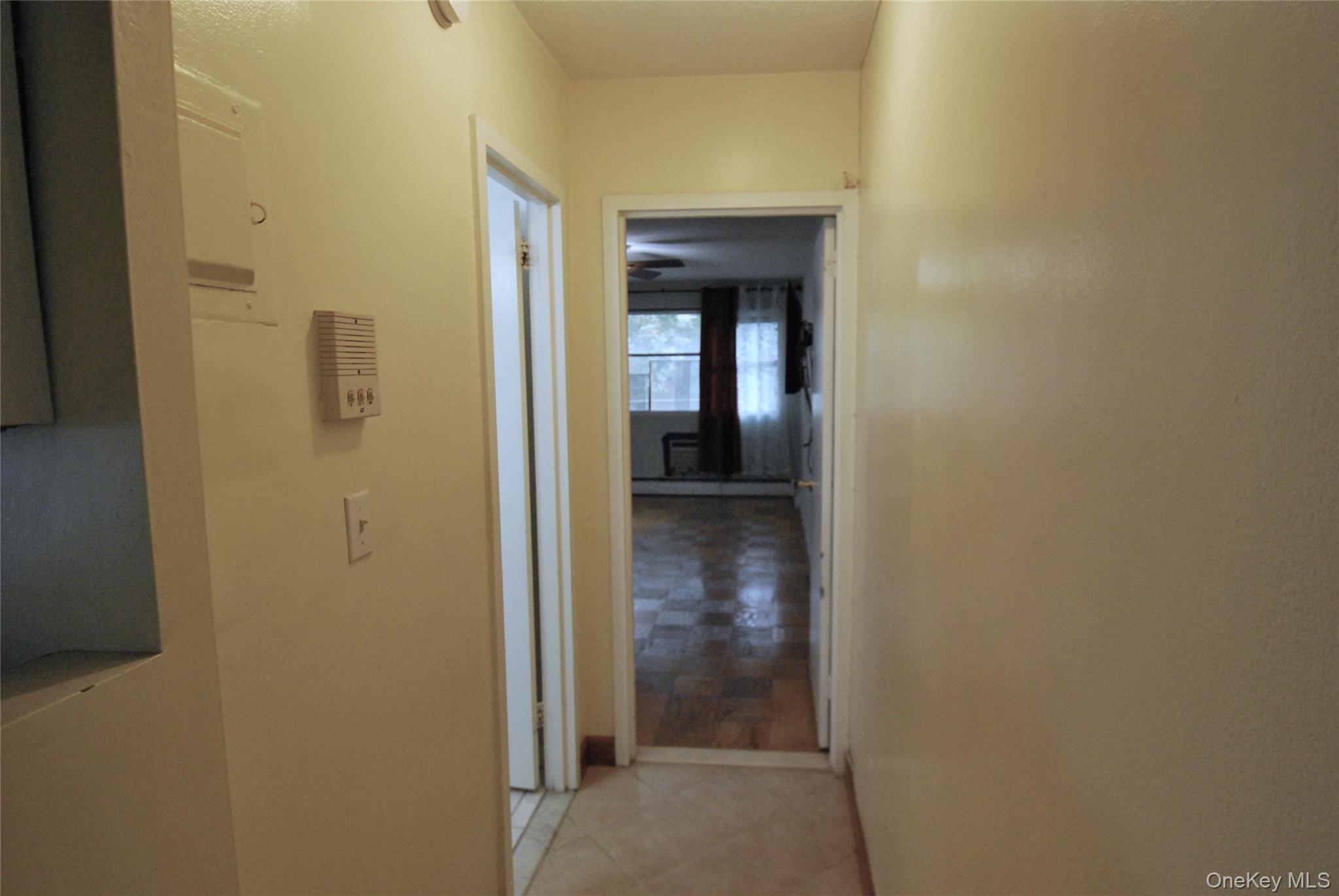 1523 Central Park Avenue, Unit 5F Yonkers, NY 10710 - Photo 14 of 20 a view of a bathroom from a hallway