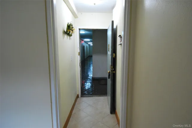 a view of a livingroom from a hallway