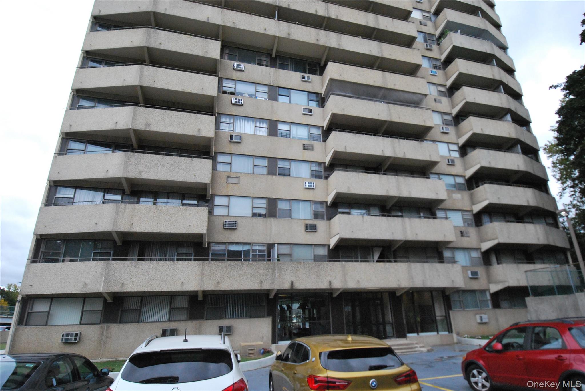 1523 Central Park Avenue, Unit 5F Yonkers, NY 10710 - Photo 19 of 20 a car parked in front of a building